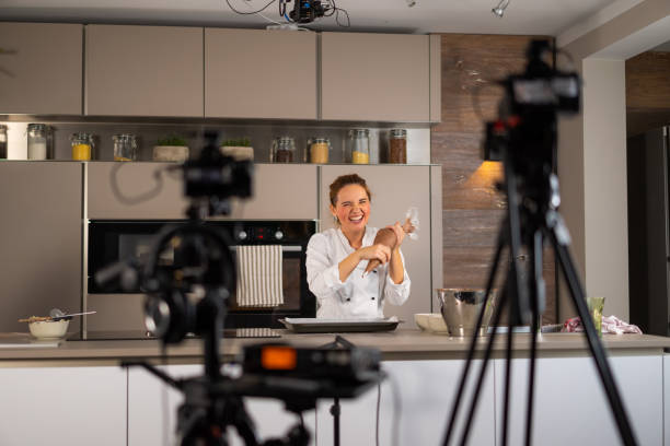 istock friendly laughing woman during baking vlogging having fun 1276909341