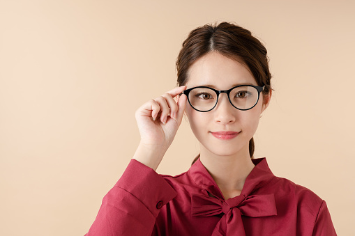 Young asian girl wearing eyeglasses.