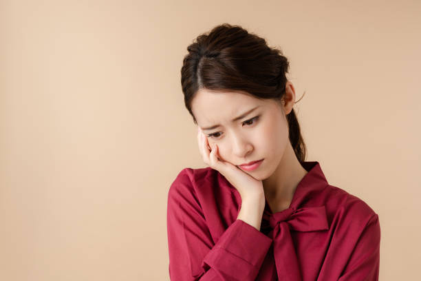 istock Confused young woman. 1276911517