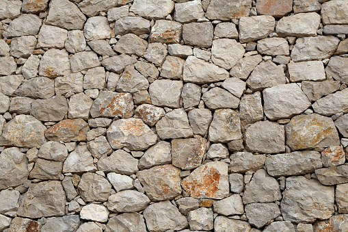 Close up of stone wall texture background.