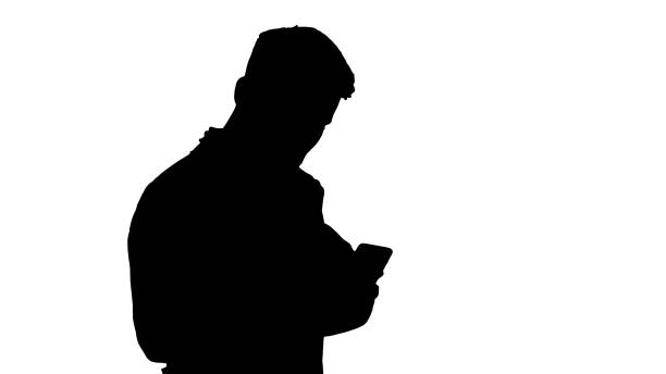 istock Male doctor in white medical uniform walking and using smartphon 1276913330