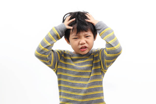 Portrait of frustrated little boy stock photo