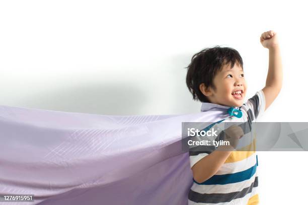 Boy Dressed As A Superhero Stock Photo - Download Image Now - Child, Playful, Playing