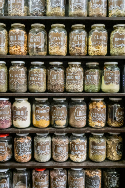 istock Jars on a store shelf labled with various spices 1276917652