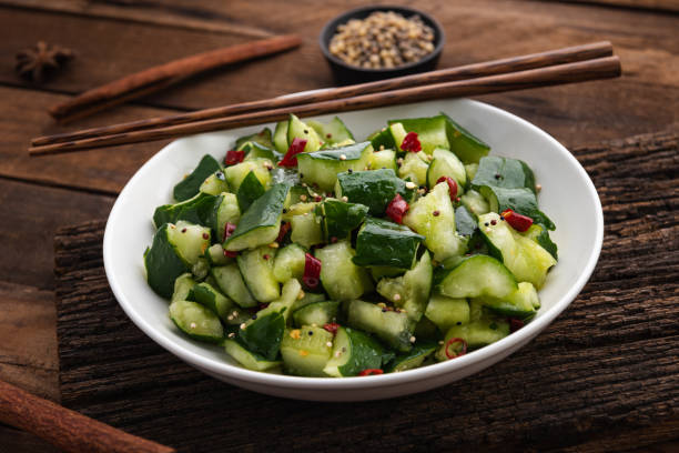 istock fresh cucumber salad with chilli on wood 1276917802