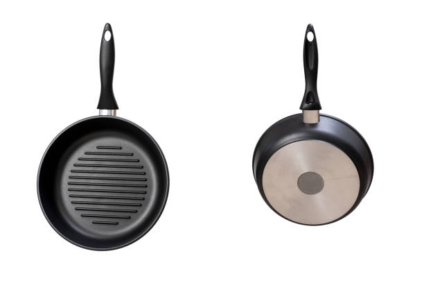 istock new round grill pans isolated on white. bottom view and top view 1276921410