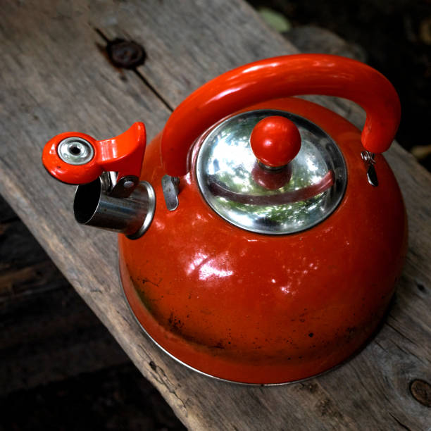 istock travel vintage tea kettle with whistle red color 1276922621
