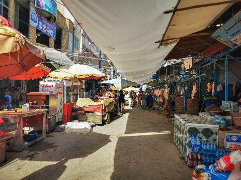 Kabul, Afghanistan - Aug 19, 2020: Afghan peoples are shopping and walking Old city bazaar of Kabul, Afghanistan