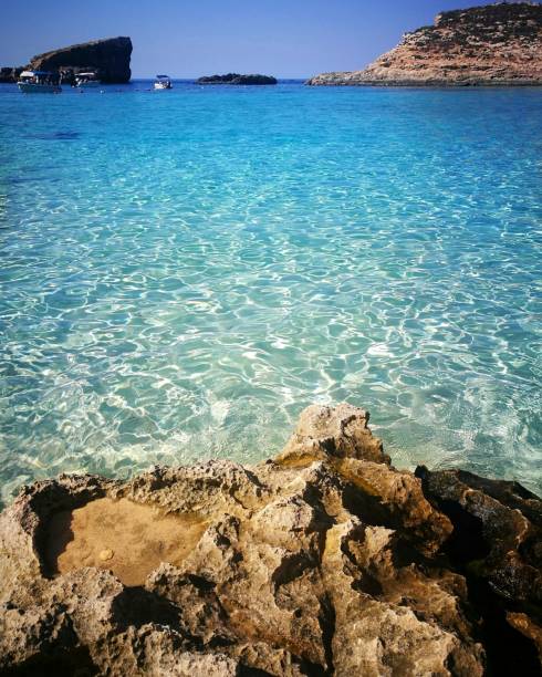 istock Cristal clear water at the Blue Lagoon, Malta 1276923634