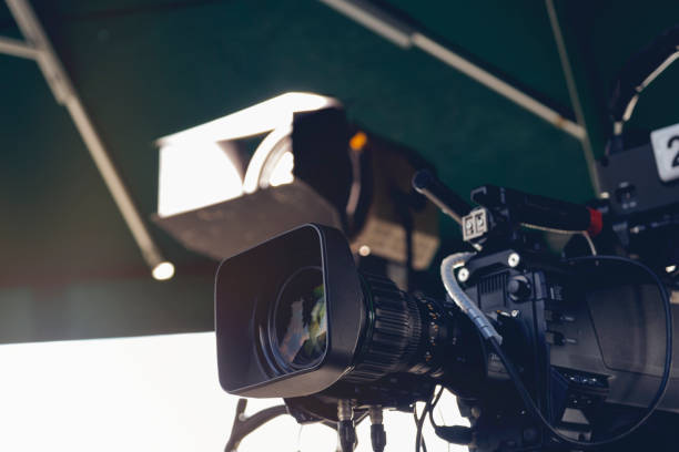 istock professional cameras and lights set up outside for live streaming 1276924916