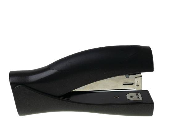 istock Close up view black stapler isolated on white background. Stationery concept. 1276924923