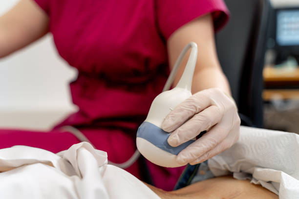istock Skillful sonographer using ultrasound machine at work. Selective focus on hand. Modern clinic. 1276929420