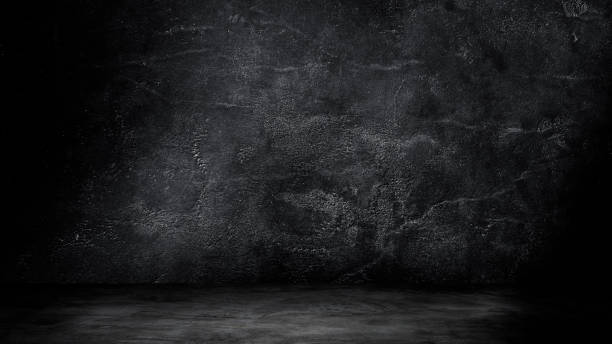 istock Studio dark room concrete floor grunge texture background with light shading. 1276932095