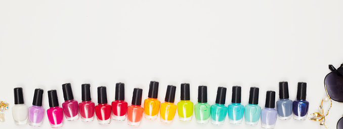 concept, manicure with nail polish, pedicure on white background, copy space, Flat Lay
