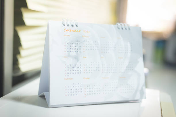 istock Blurred calendar in  white tone planning 2021 concept. 1276936149