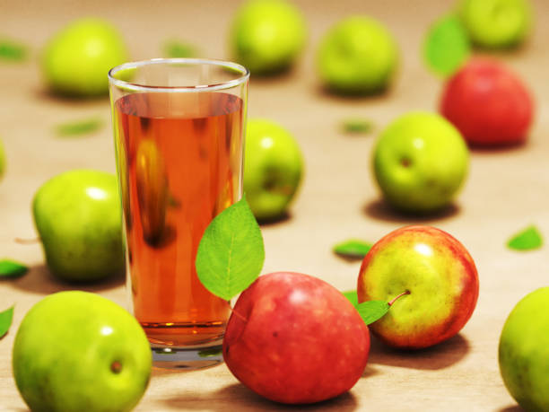 istock A glass of apple juice with apples. 1276938121