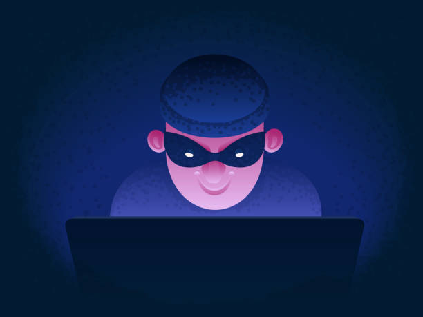 インターネット詐欺。ラップトップモニターの背後にあるハッカー。フィッシングとオンライン監視。銀行の個人情報の盗難とハッキング - identity theft点のイラスト素材／クリップアート素材／マンガ素材／アイコン素材