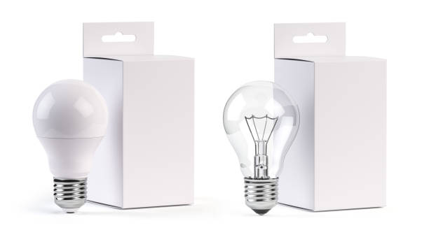 istock Electric light bulbs LED and incandescent with blank paper box isolated on white. Mock up 1276944146