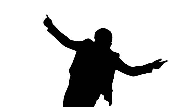 Medium shot. Front view. Silhouette Boy in white suit dancing. Professional shot in 4K resolution. 062. You can use it e.g. in your medical, commercial video, business, presentation, broadcast