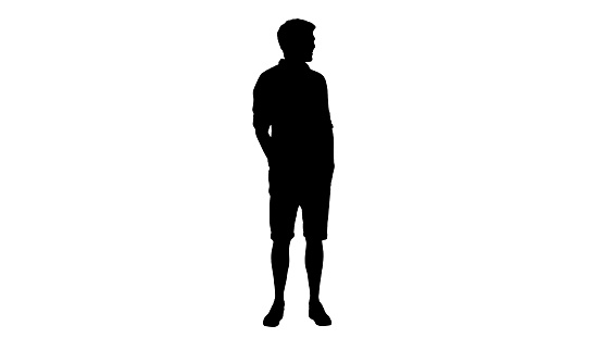 Wide shot. Side view. Silhouette Casual young man looking to the side and talking about something. Professional shot in 4K resolution. 047. You can use it e.g. in your medical, commercial video, business, presentation, broadcast