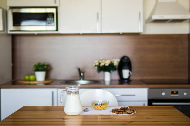 istock milk, corn flakes and cookies in modern kitchen 1276946613