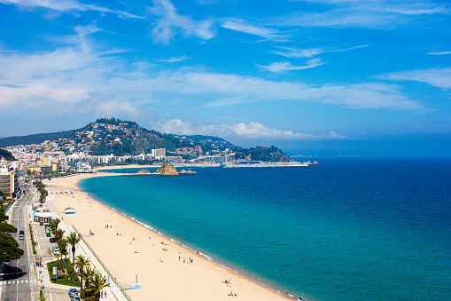 beautiful aerial view of beach and town Blanes, Costa Brava, Catalonia, Spain - May 23, 2018: City Beach in Blanes