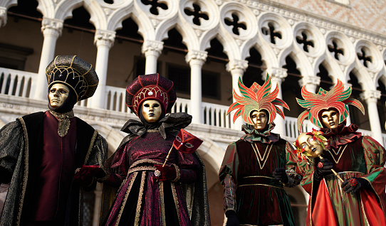 Venice, Italy - March 4, 2019 Carnevale di Venezia 2019 with dressed up people in front of the Doge's palace