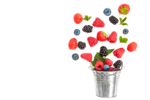 Fresh Berries and a Small Metal Bucket
