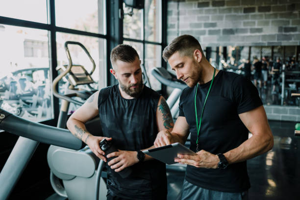 istock Indoor personal cardio training in gym 1276949803