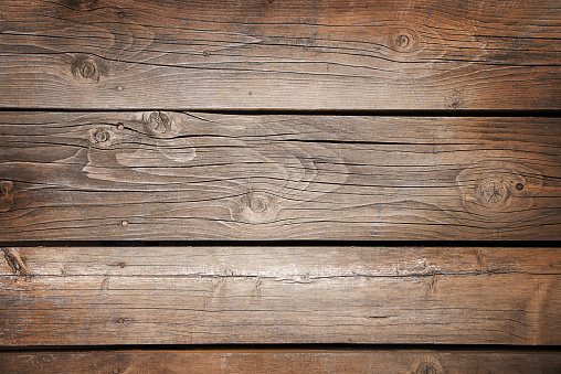 Old wooden plank with horizontal stripes