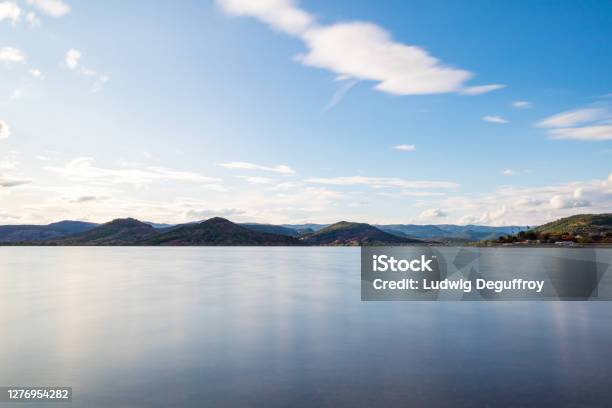 Long Exposure View Over The Lac Du Salagou In Cloudy Weather Stock Photo - Download Image Now