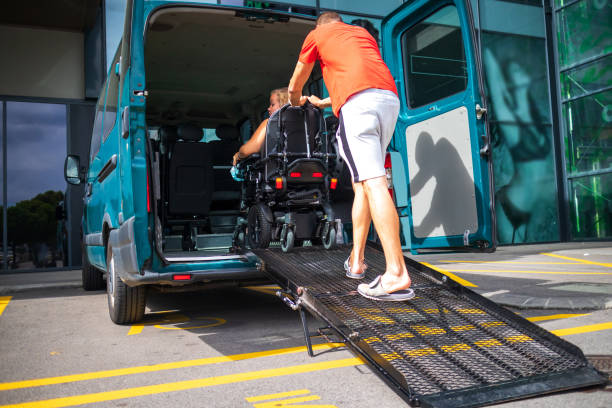 istock Disabled person on wheelchair using van ramp 1276959249