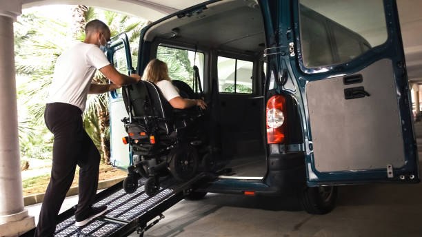 istock Disabled person on wheelchair using van ramp 1276959254
