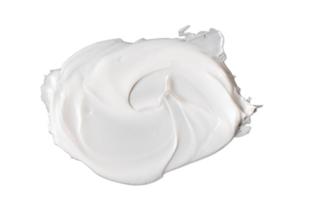 istock white cosmetic face cream texture on white background 1276959651