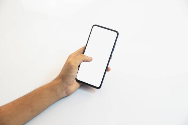 istock hand holding a smartphone in white background 1276964846