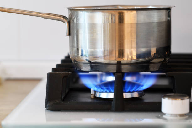 istock Pot on the gas stove in kitchen 1276967142