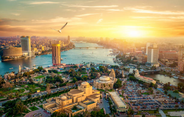 View from the Cairo tower Panorama of Cairo cityscape taken during the sunset from the famous Cairo tower, Cairo, Egypt egypt skyline stock pictures, royalty-free photos & images