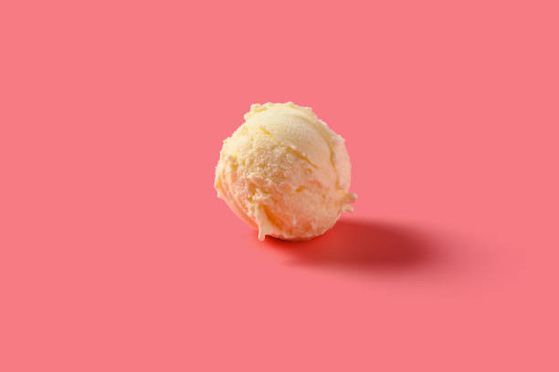 istock side view vanilla flavor ice cream ball on pink background 1276967550