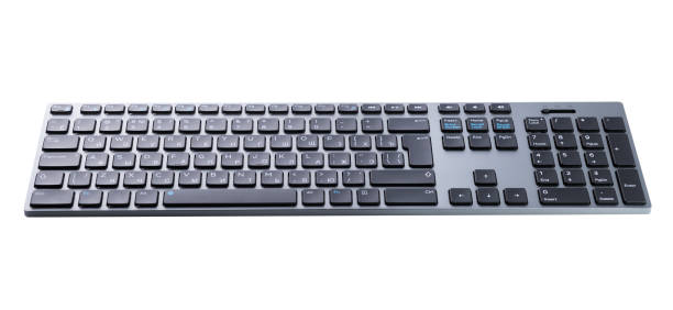 istock Wireless gray keyboard on a white background close-up. 1276968171