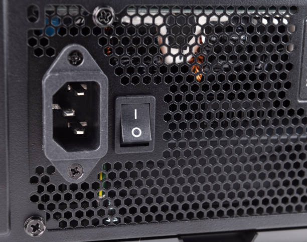 istock Back panel of the system unit.The place where the mains cable is connected. 1276968197
