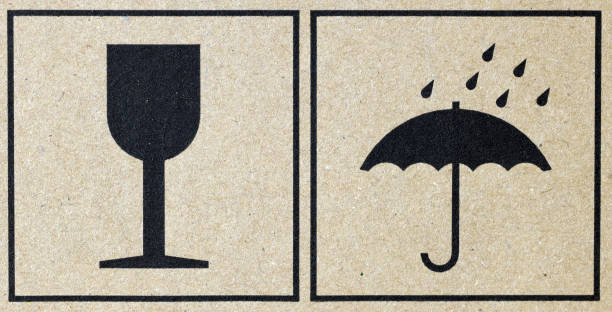 istock Warning signs on the carton box packaging. 1276968239