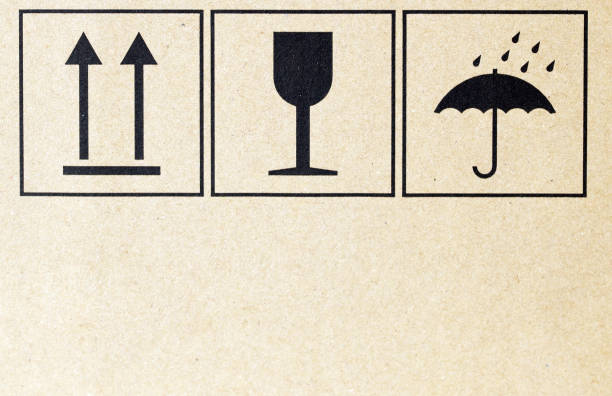 istock Warning signs on the carton box packaging. 1276968327