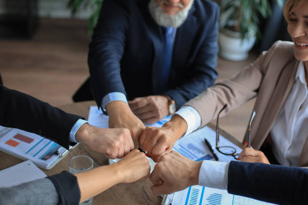 istock Business people teamwork stacking hand together concept. 1276968396