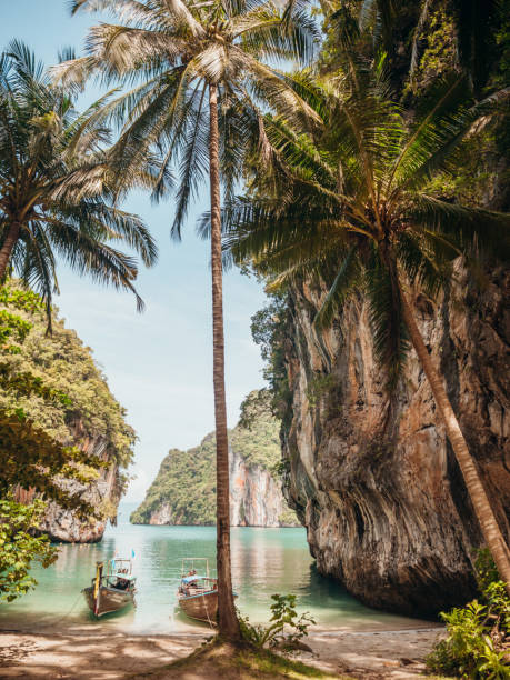 istock Long tail boat in lagoon, Thailand 1276968465