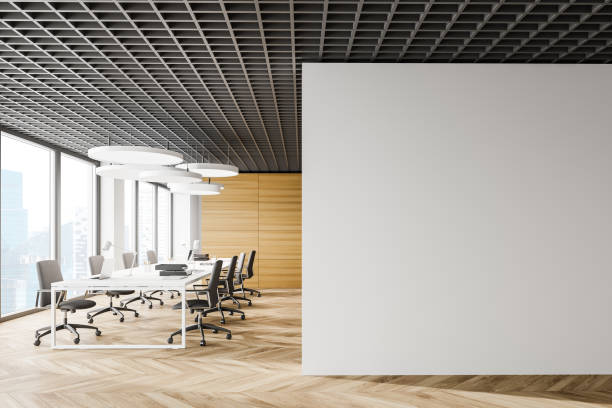 istock Wooden open space office with mock up wall 1276968747