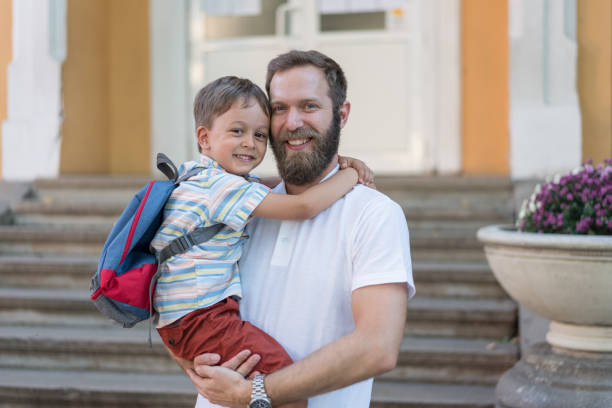 istock Father and son in the schoolyard 1276970166
