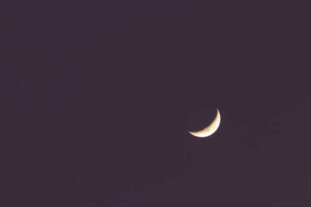 istock Crescent moon on sweet sky. Look like a smile on a good day. 1276972769