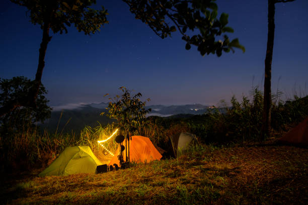 istock Khao Chang Phueak Mountain at night time with camping tents 1276973432
