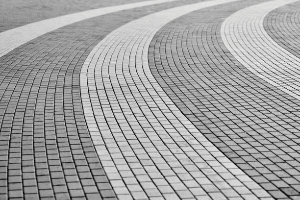 istock Circle tile road. Stone pavers in city park 1276975248