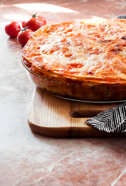 istock Homemade lasagna in round glass baking dish 1276975474